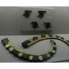 Gold pendants of mountain's goat heads